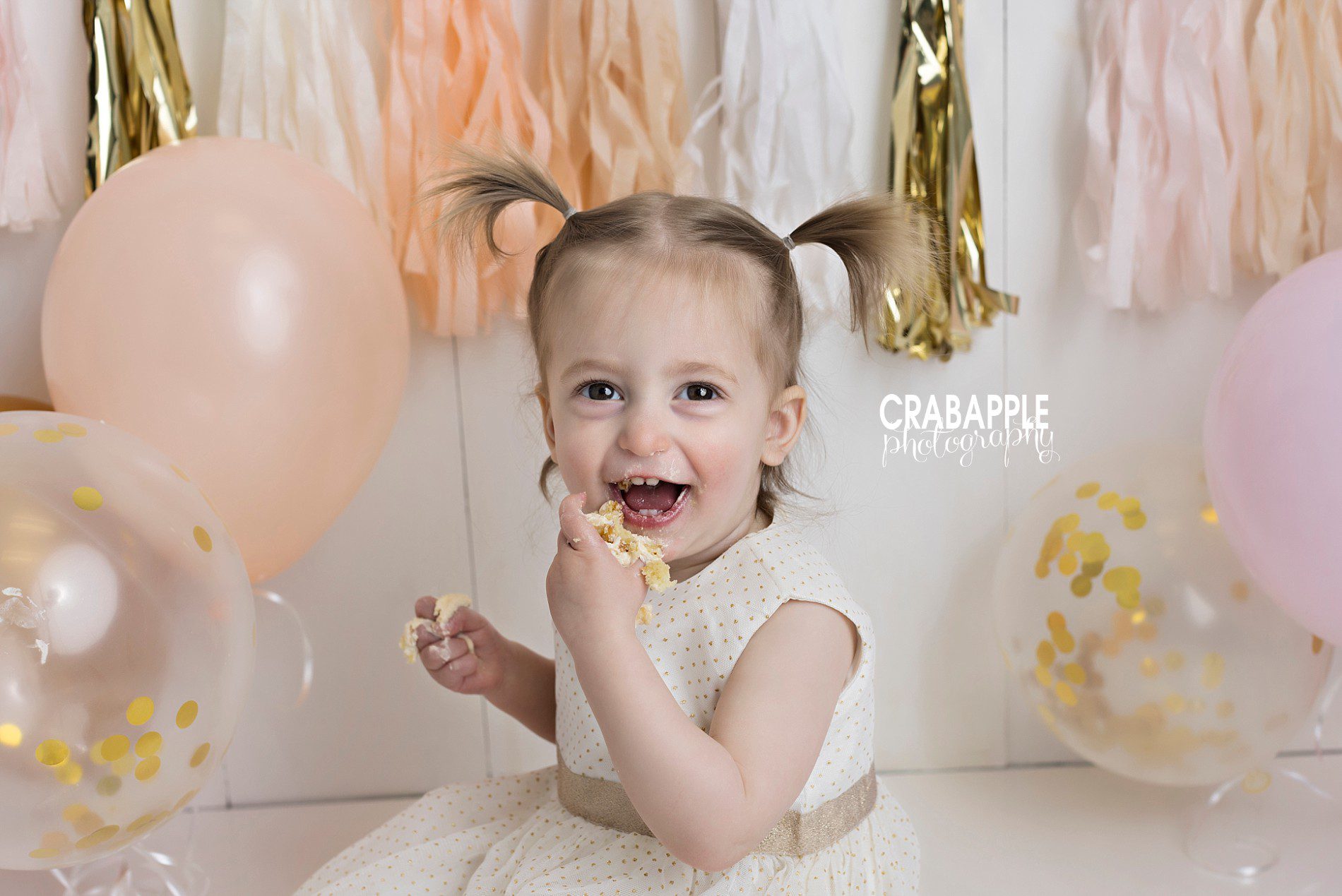 pink peach and gold cake smash portraits