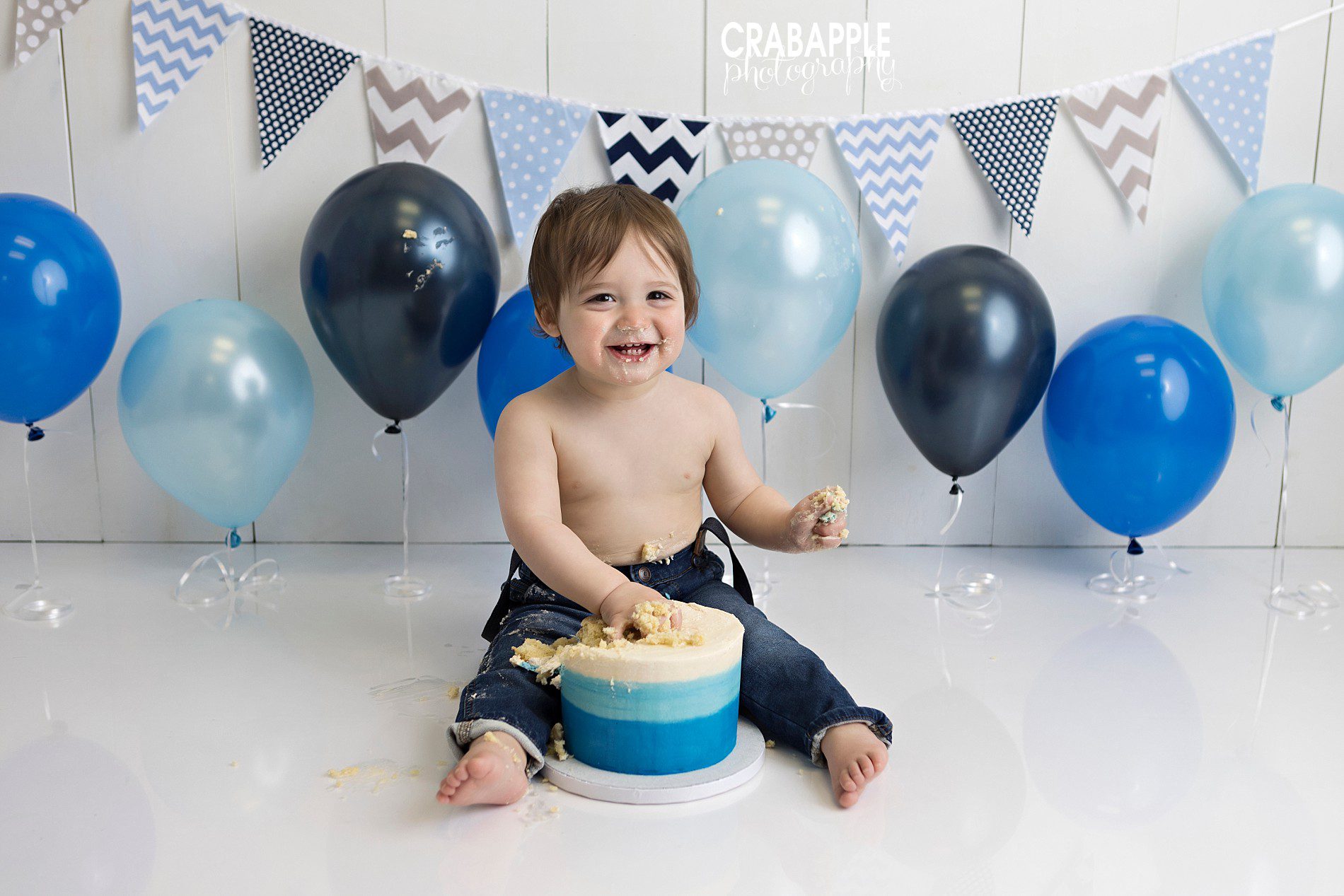 blue jeans and suspenders cake smash photos