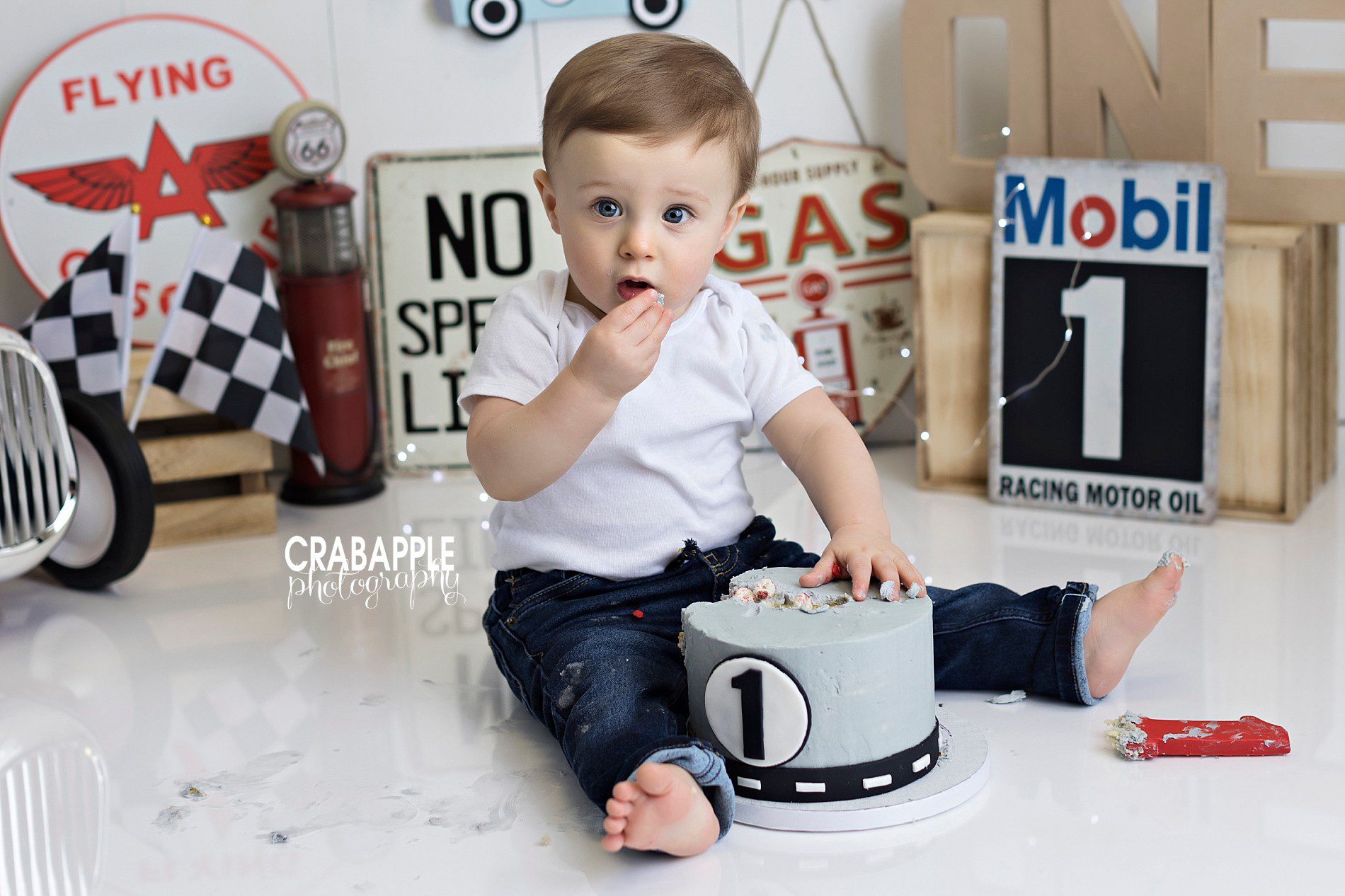 vintage car and gas station themed cake smash photos