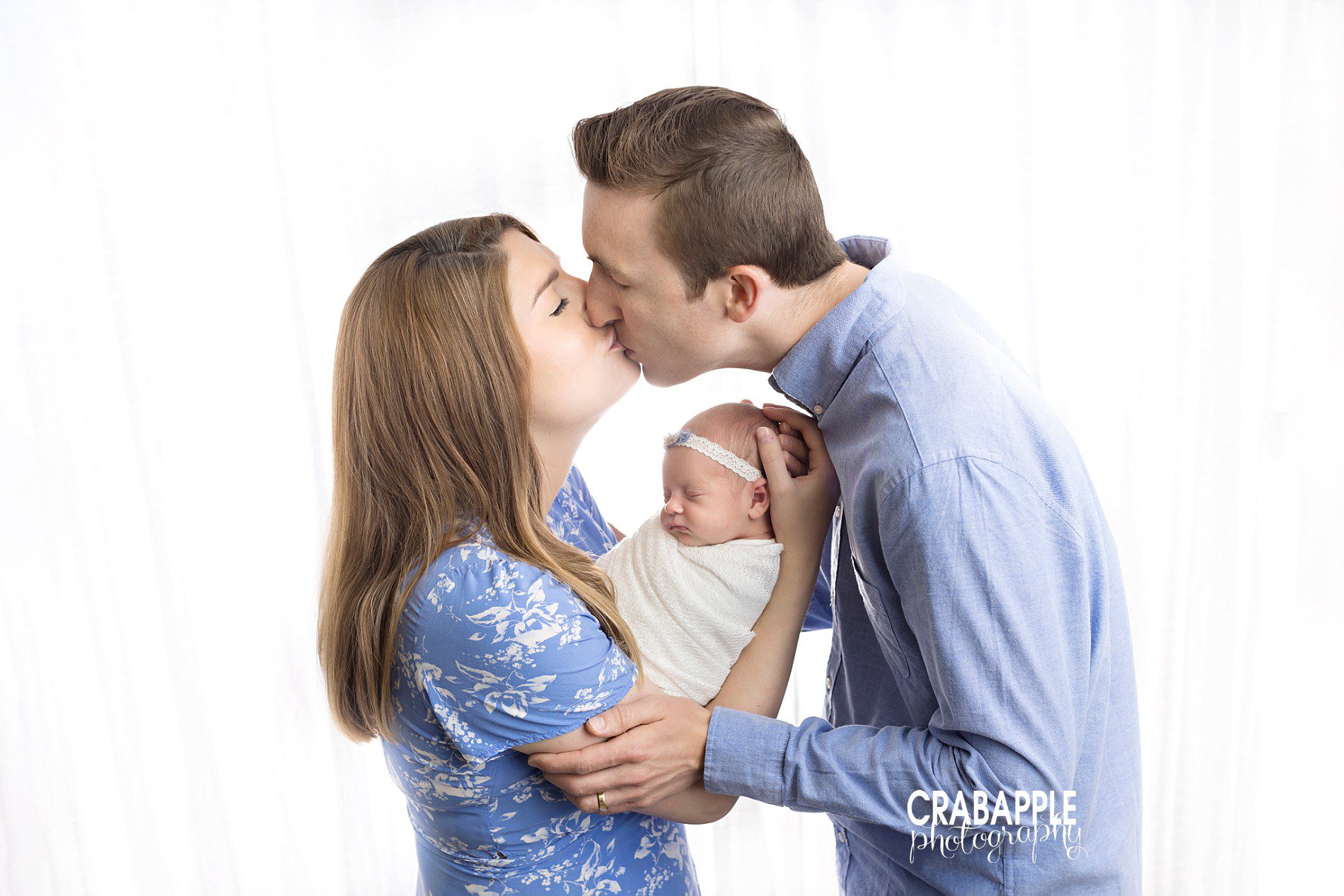 styling for newborn family photos using blue
