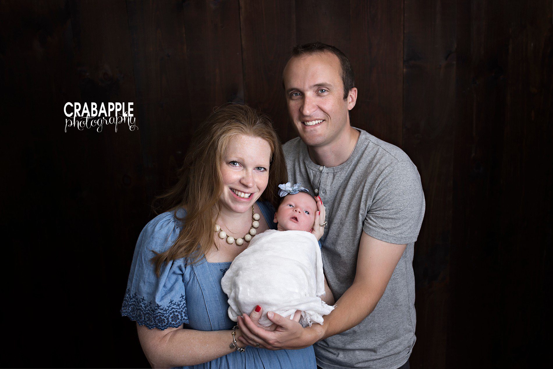 newborn photo with parents