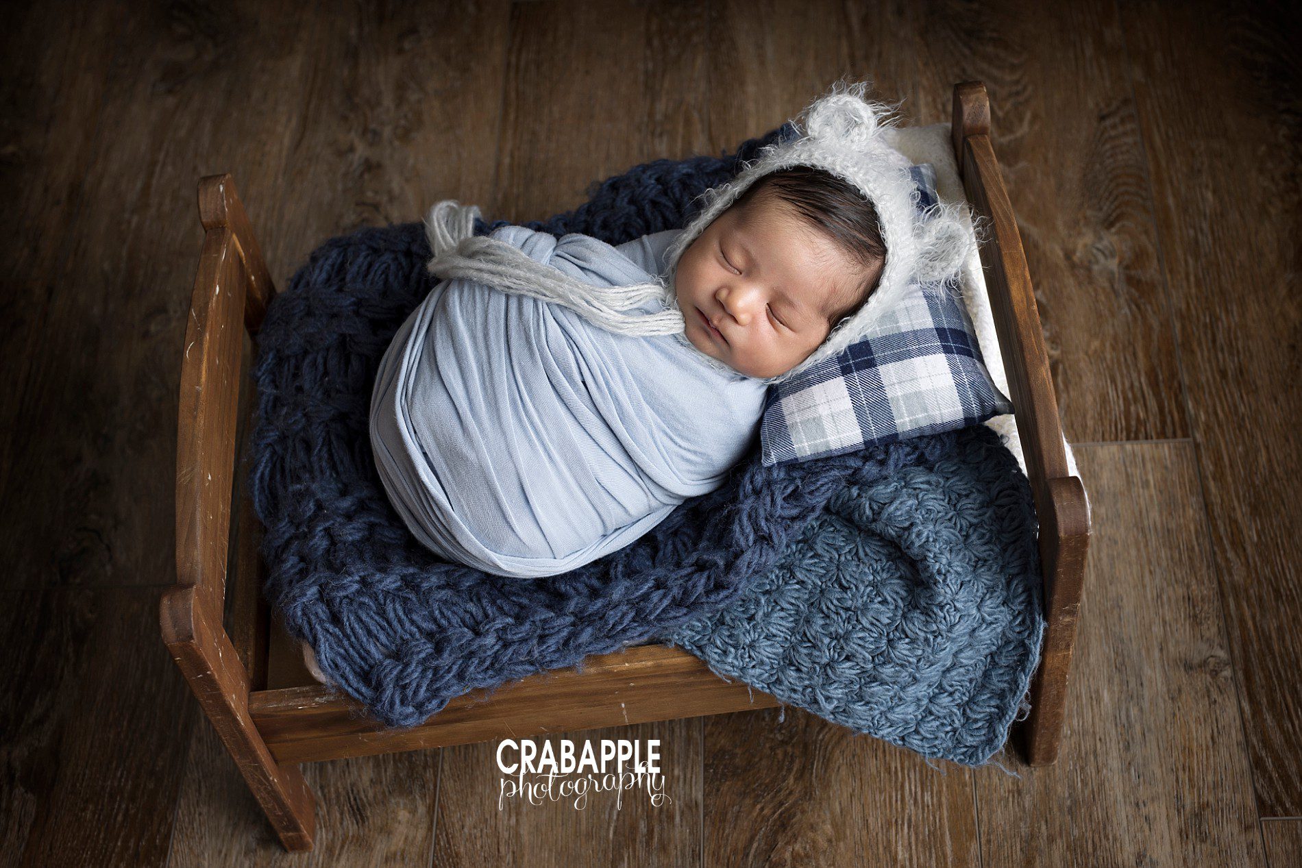 classic and timeless newborn boy photos using blue