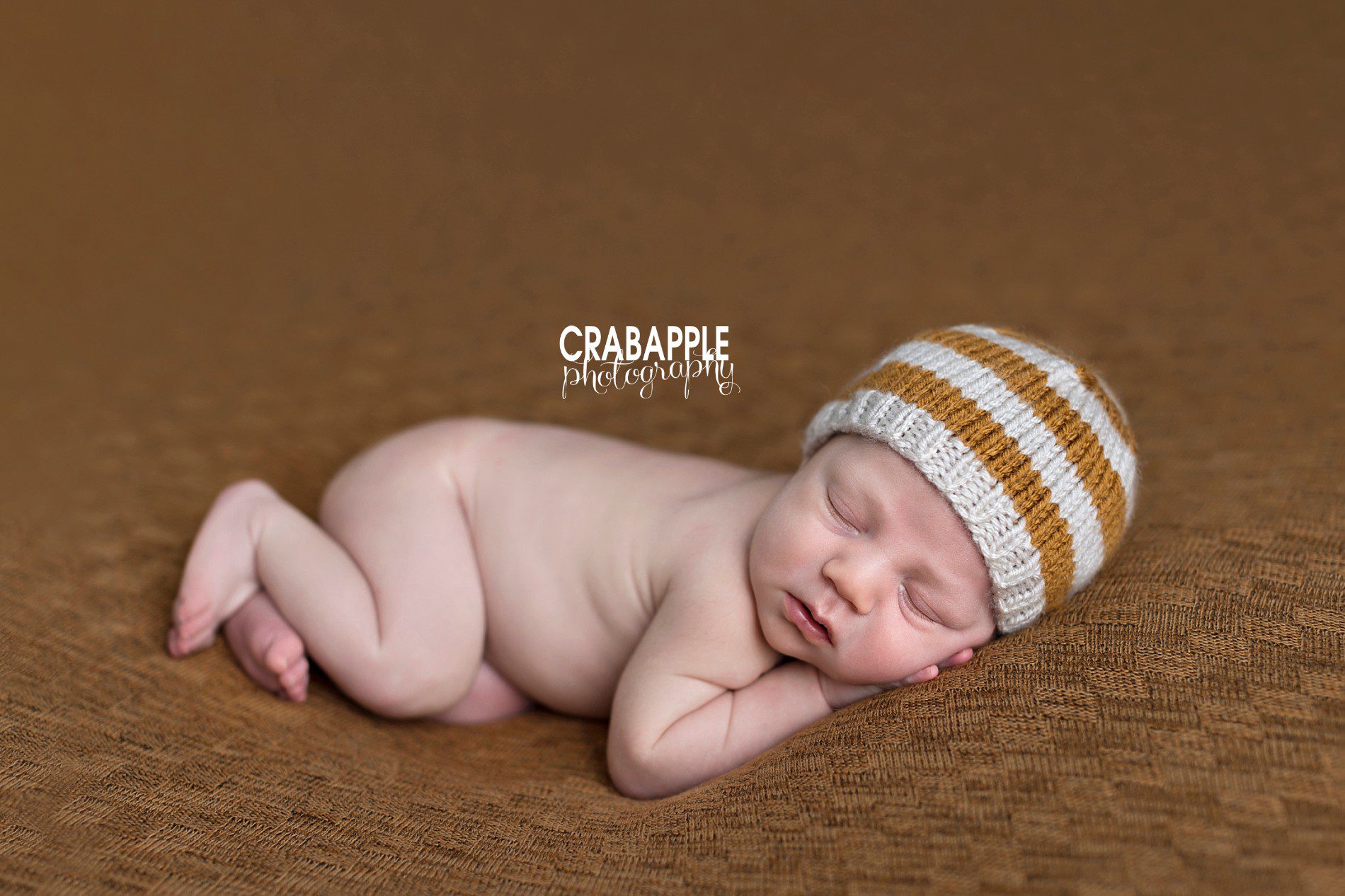 brown and cream newborn pics for boys neutral color palette
