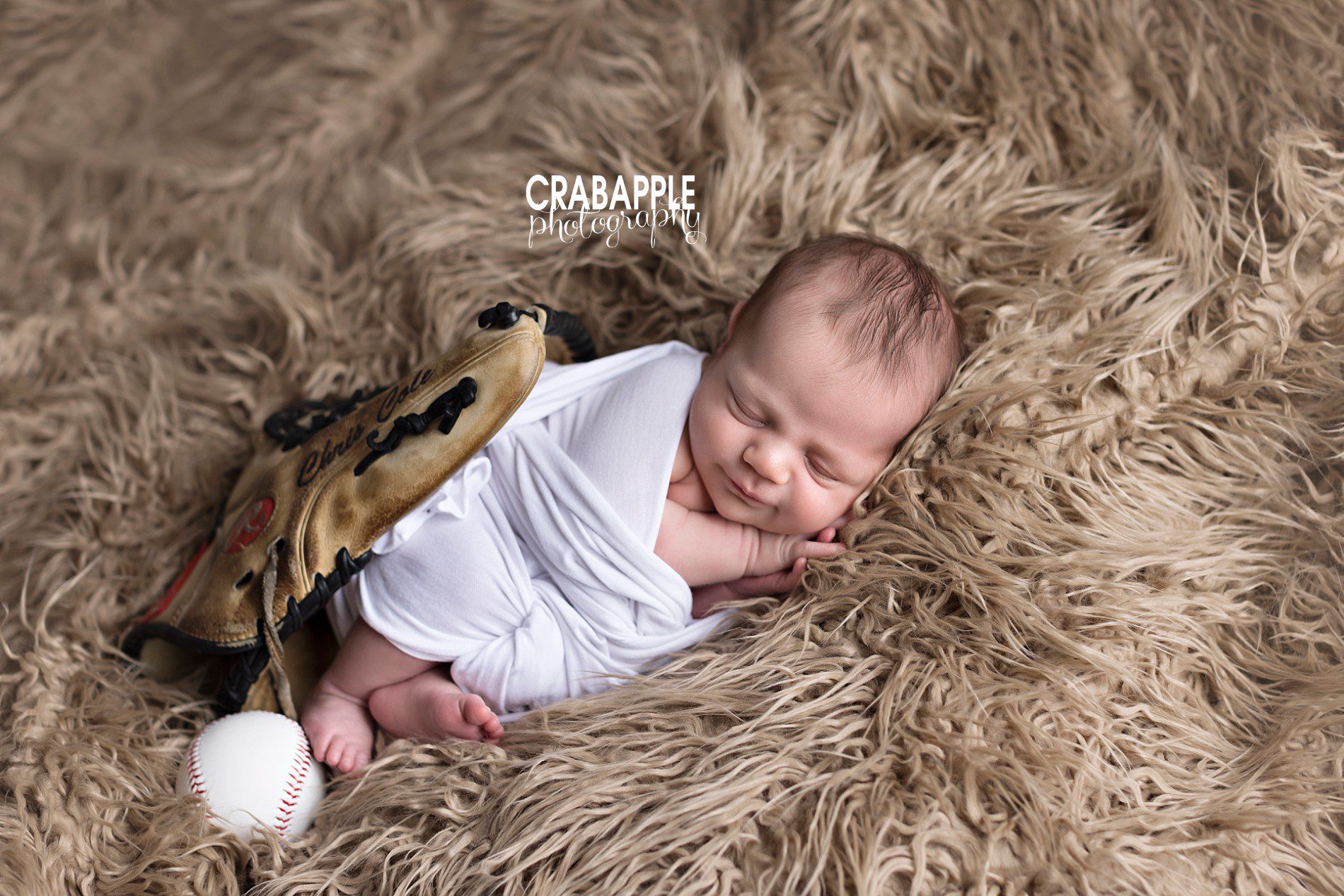 baseball newborn pictures with glove and ball