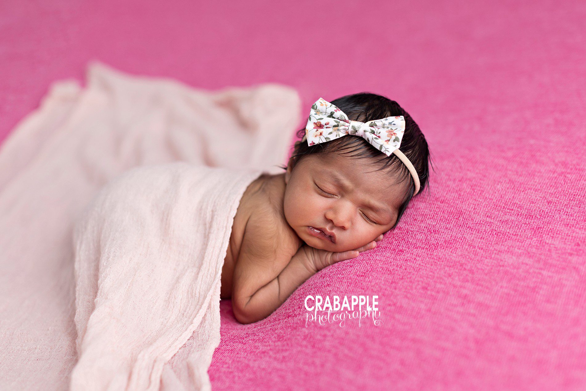bright and colorful newborn photos for girls using pink