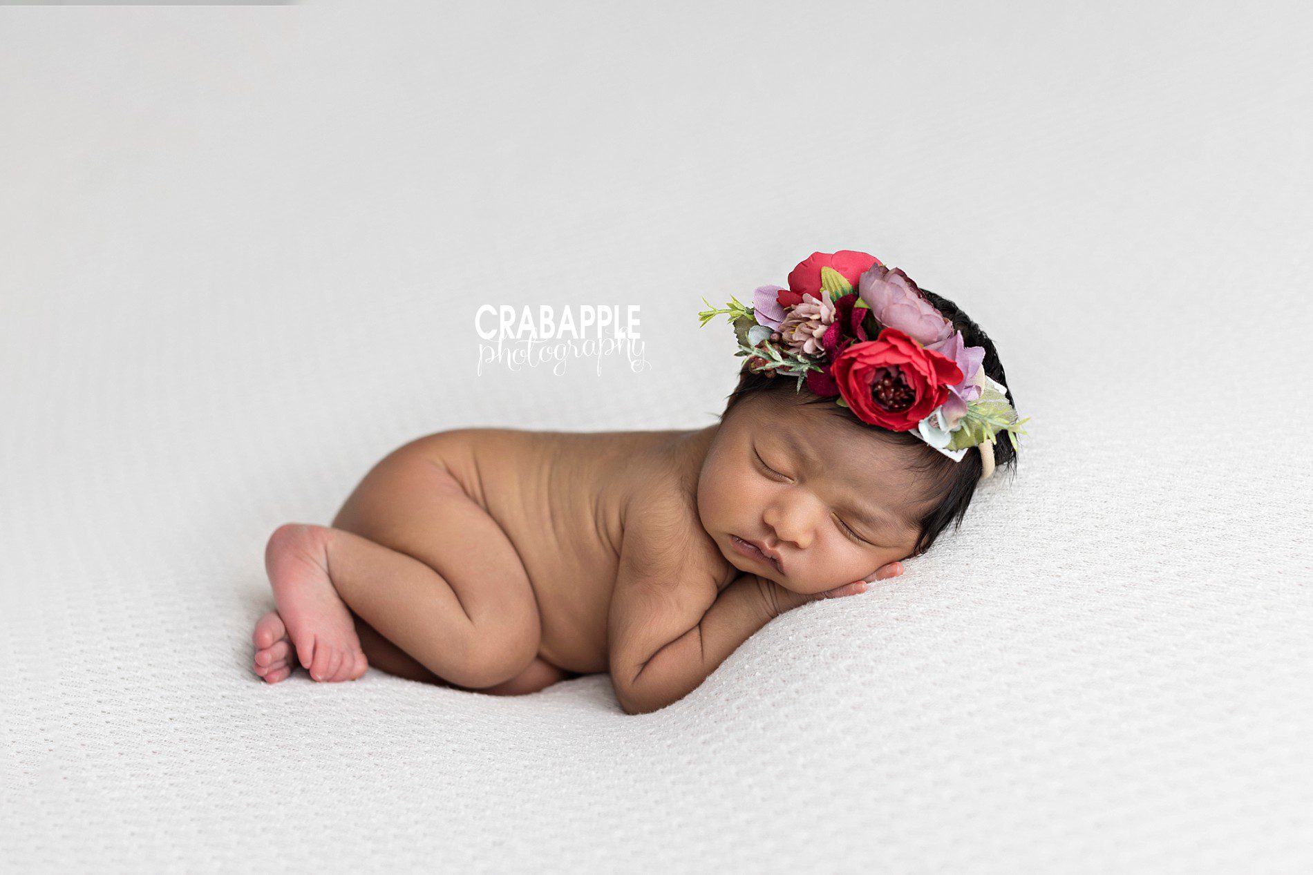 simple newborn photos with floral headband