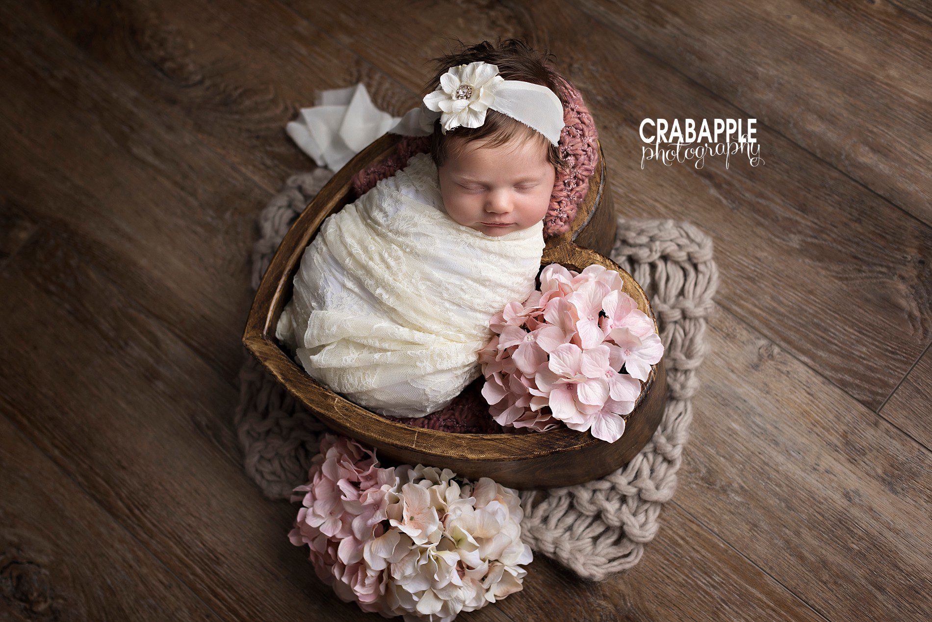 using faux flowers in newborn photos