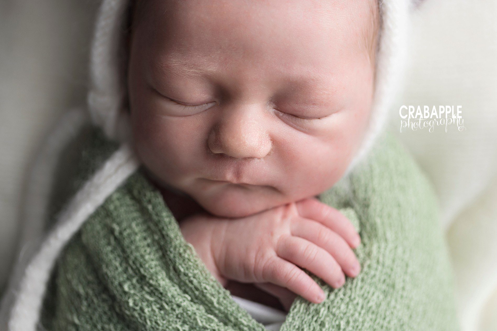 newborn photos for boys with light green