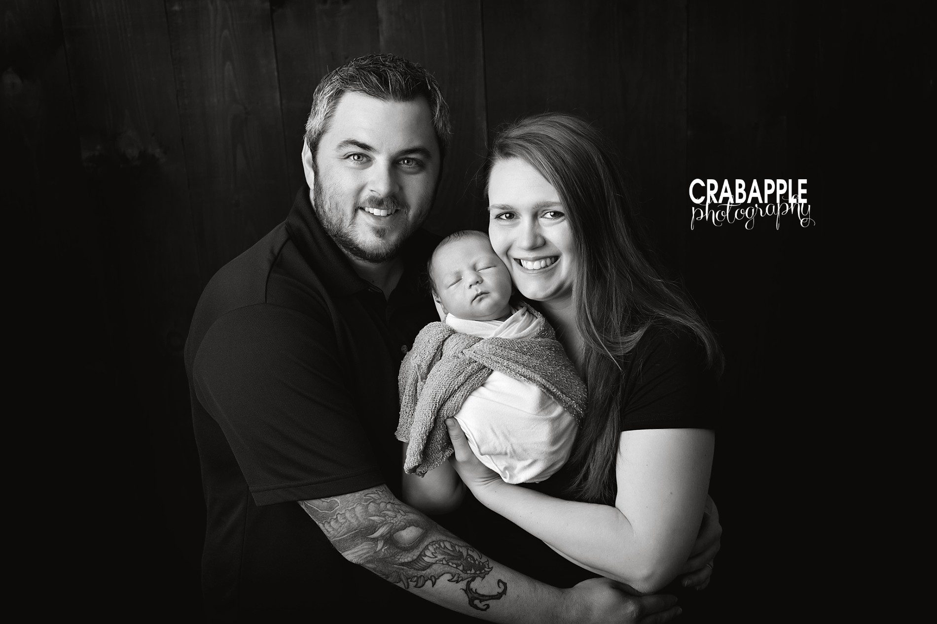 black and white family portraits with newborn