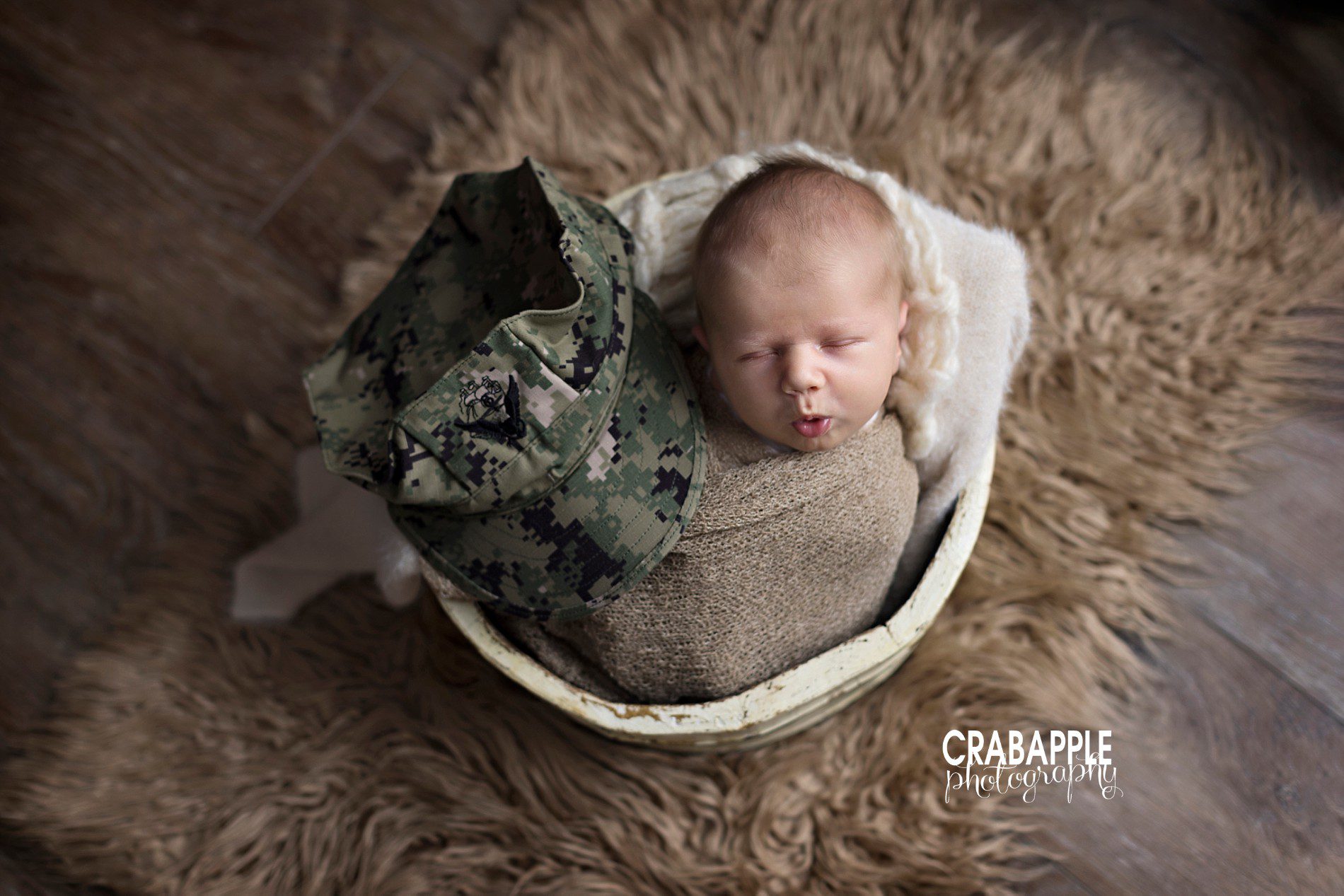 newborn photos with navy cap