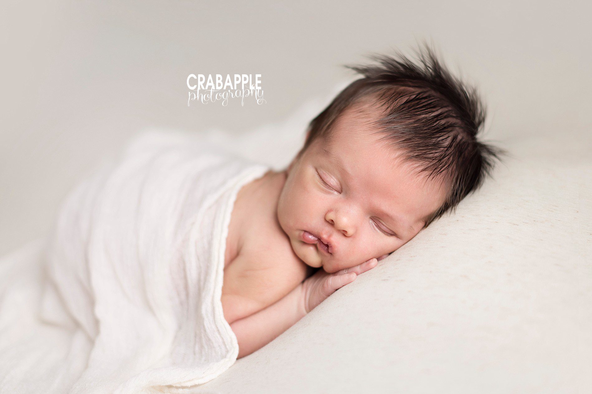 Styling newborn photos with white