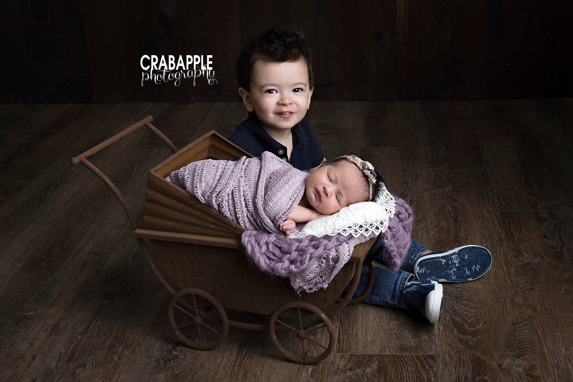 newborn photos with older toddler sibling