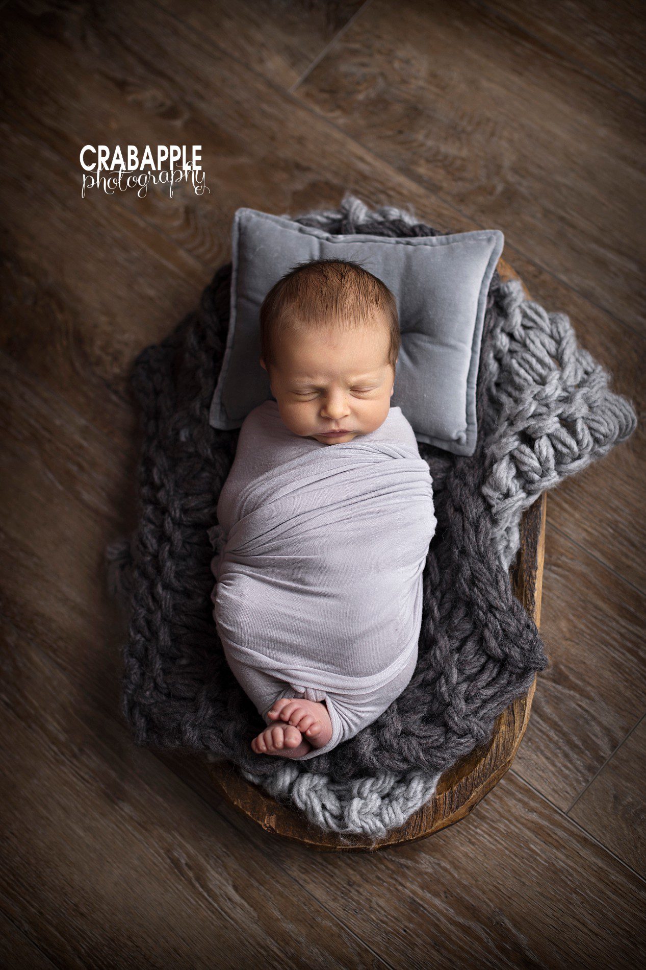 using gray and props in newborn photos