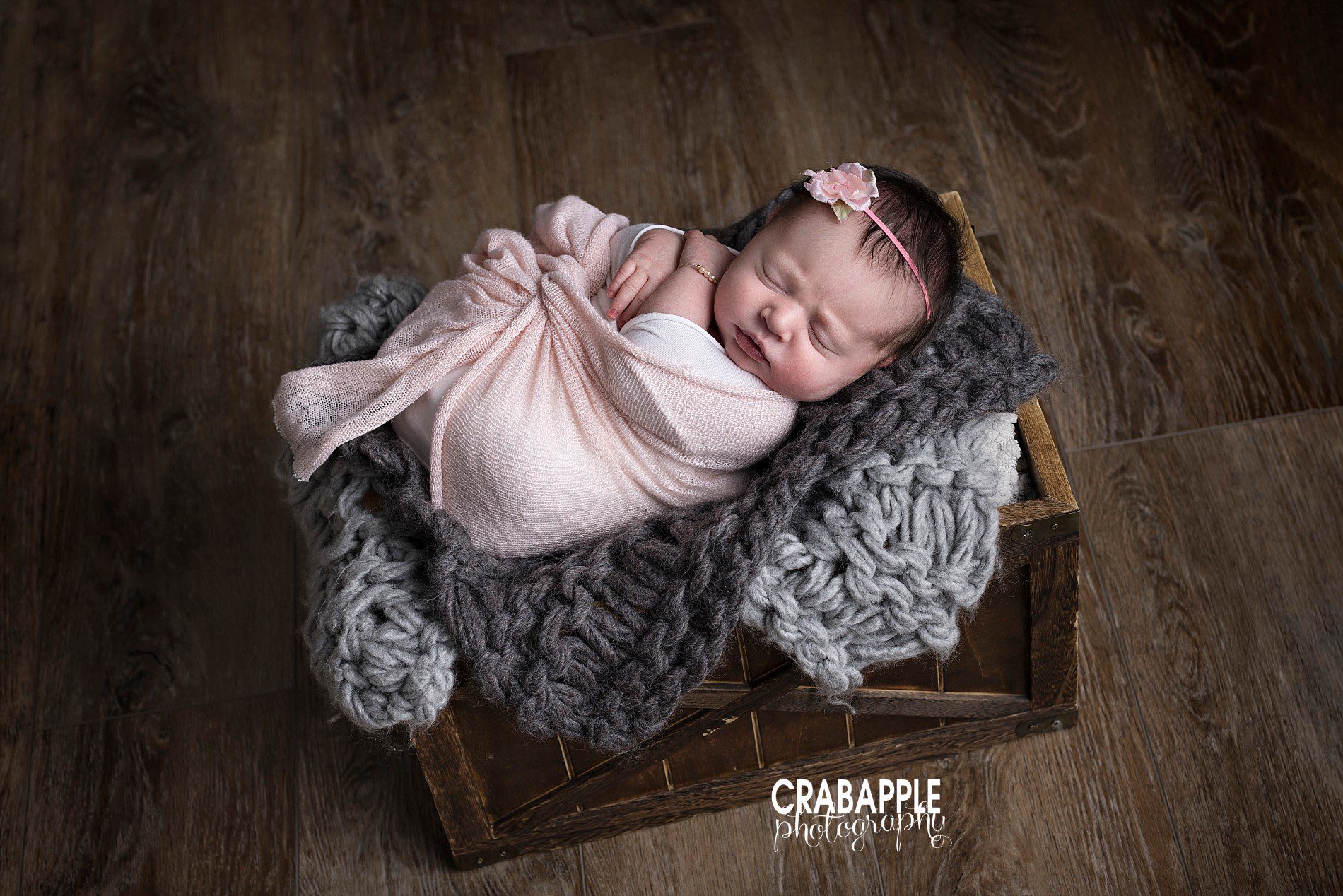 baby girl newborn photos using gray and pink