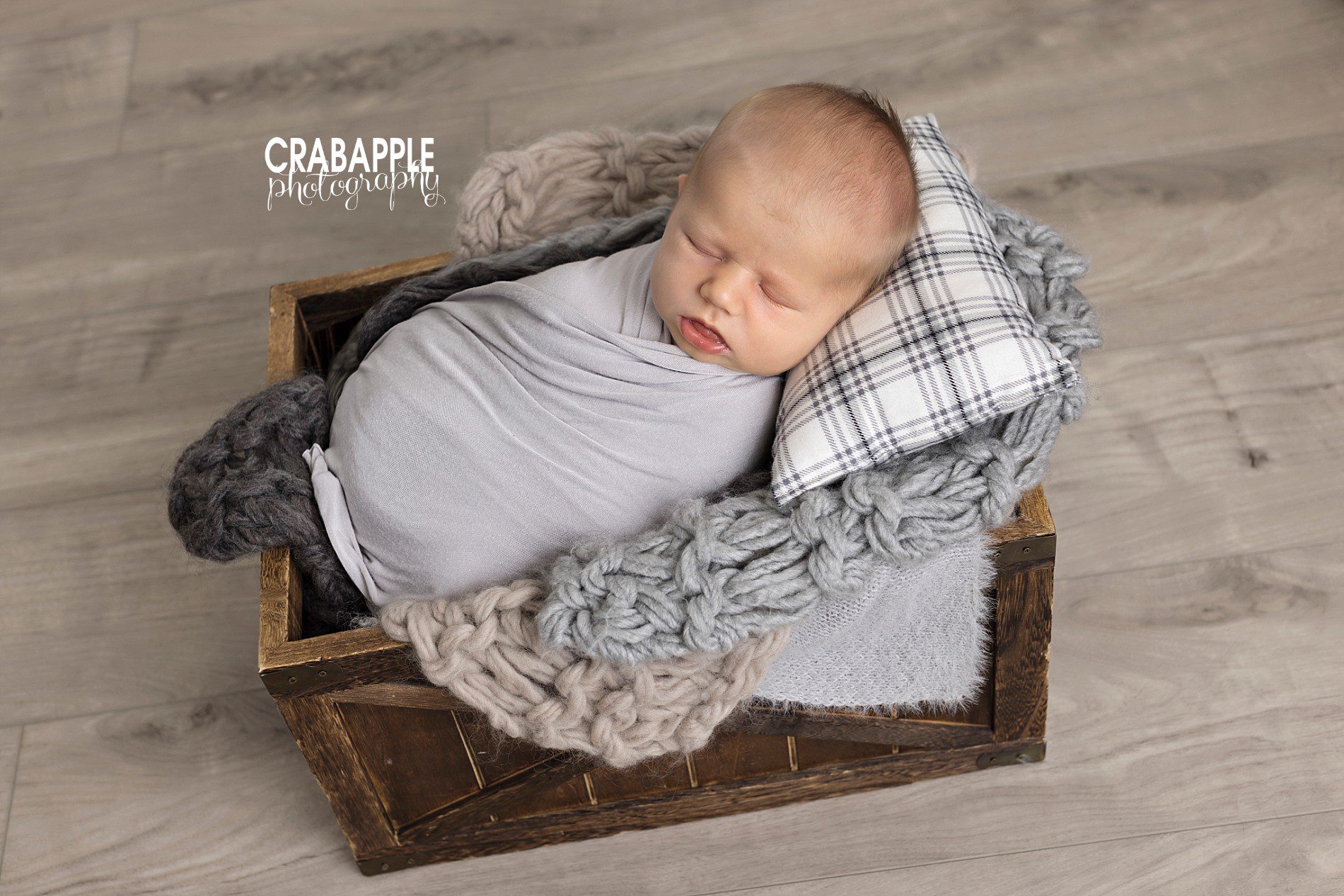 styling baby photos using gray props