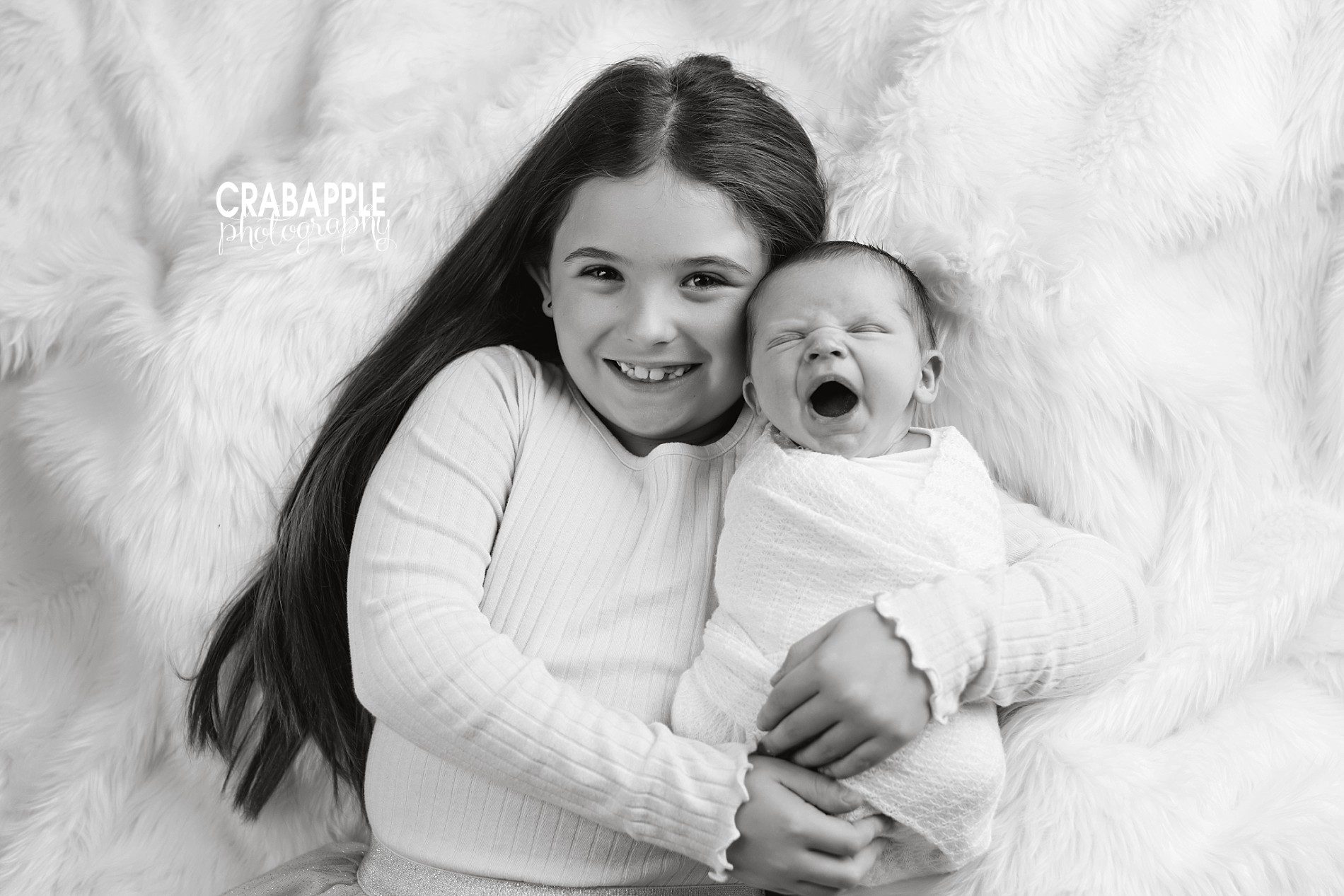 black and white newborn photos with sibling