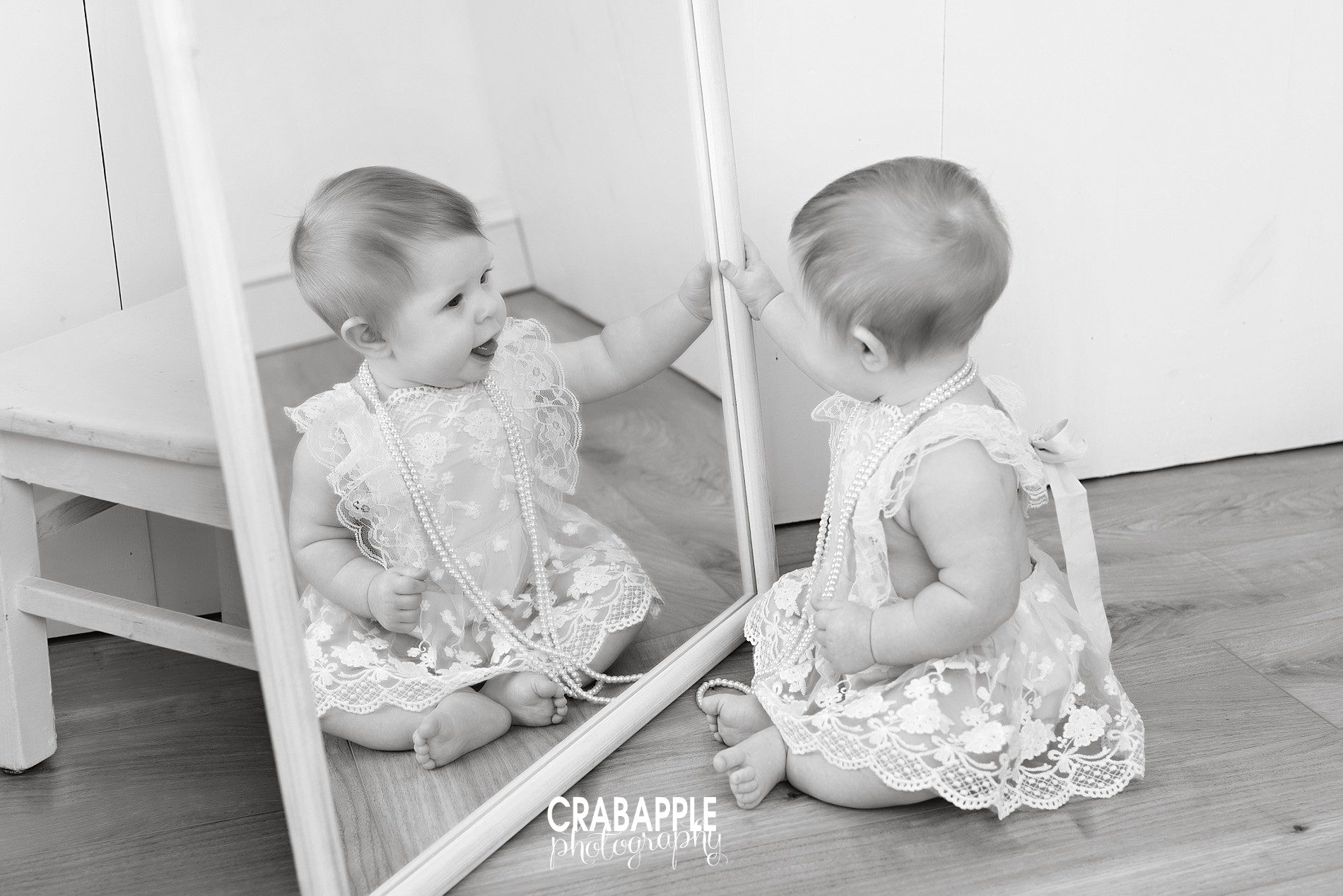 posing baby photos with a mirror