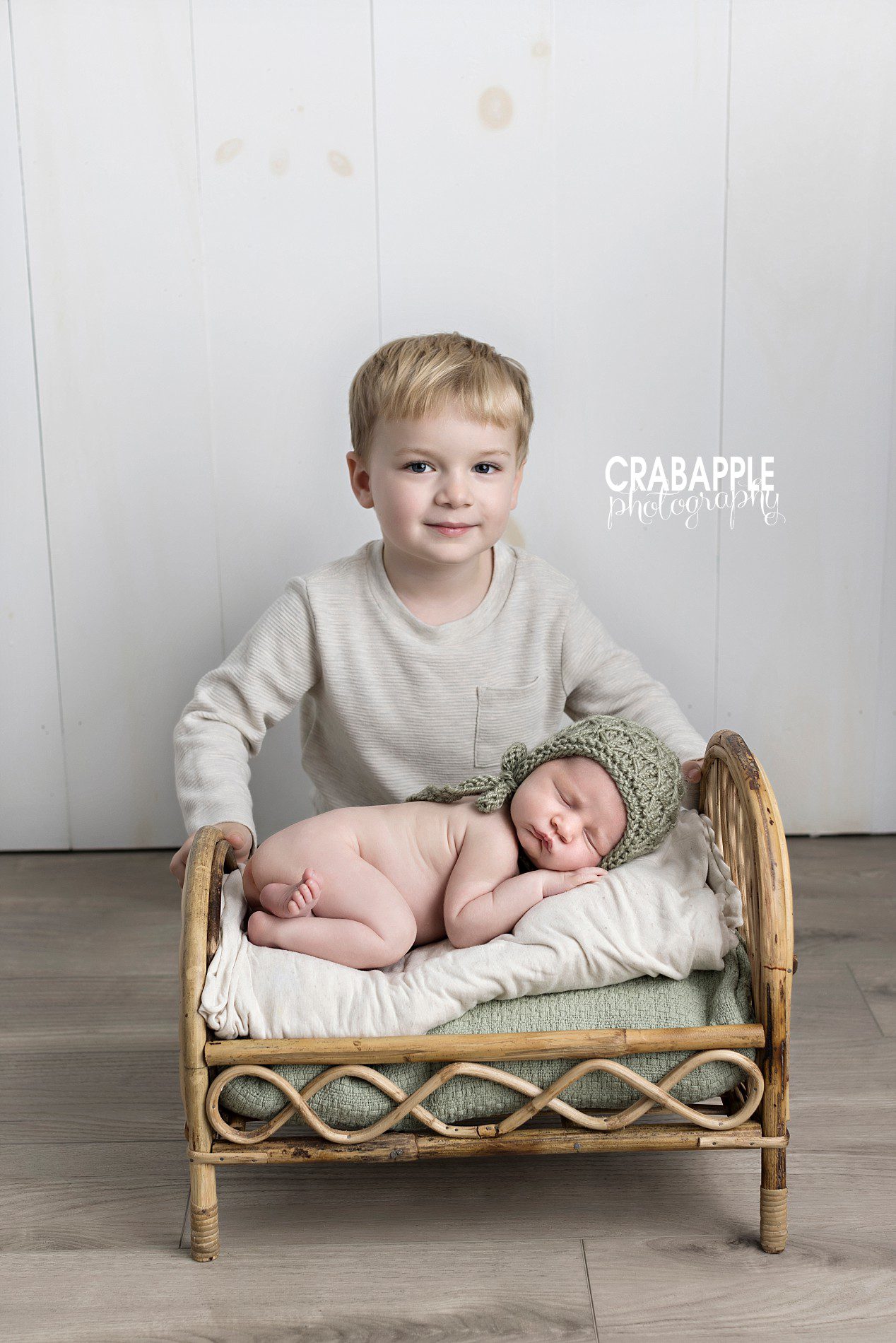 newborn sibling toddler photos