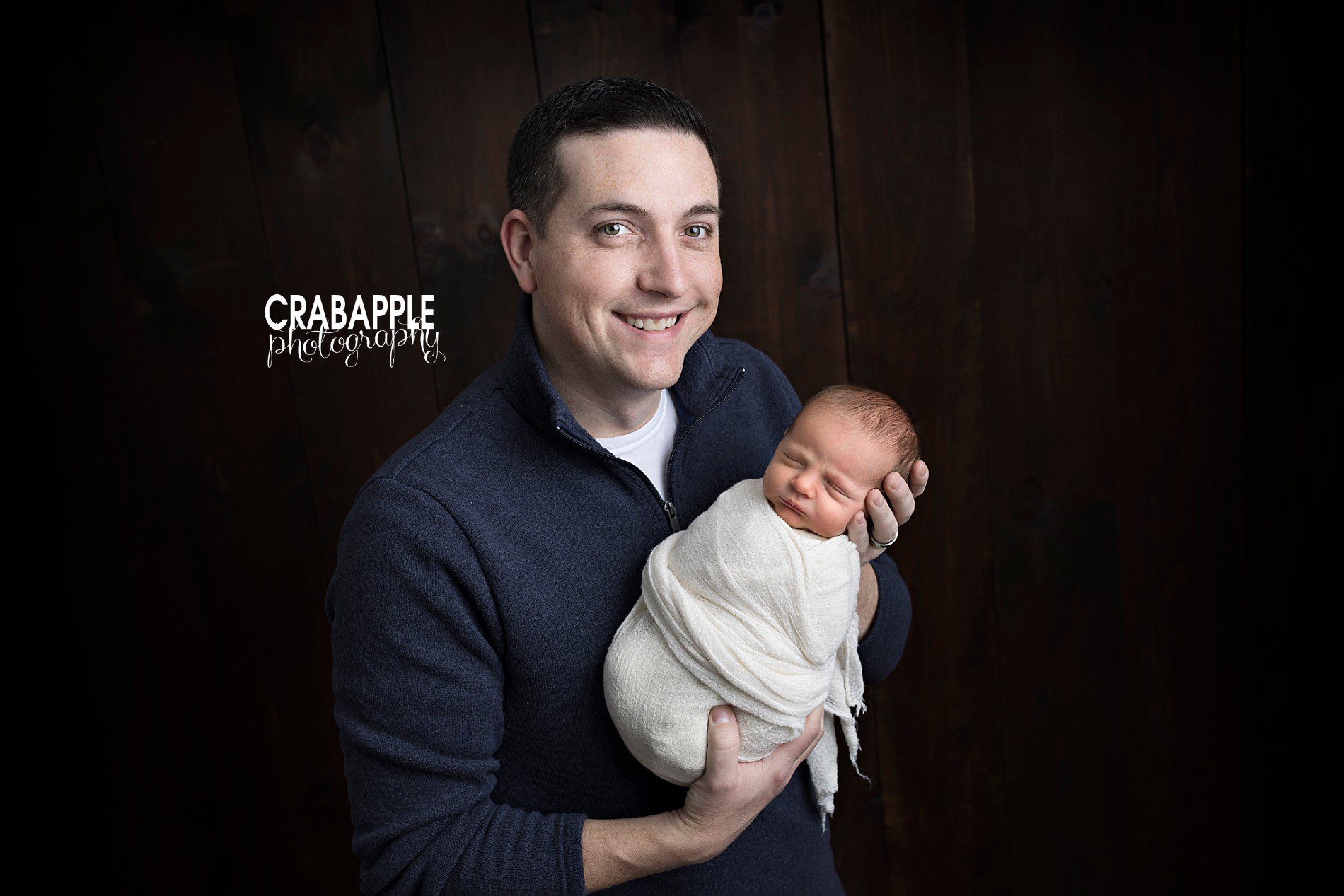 dad and son newborn pictures