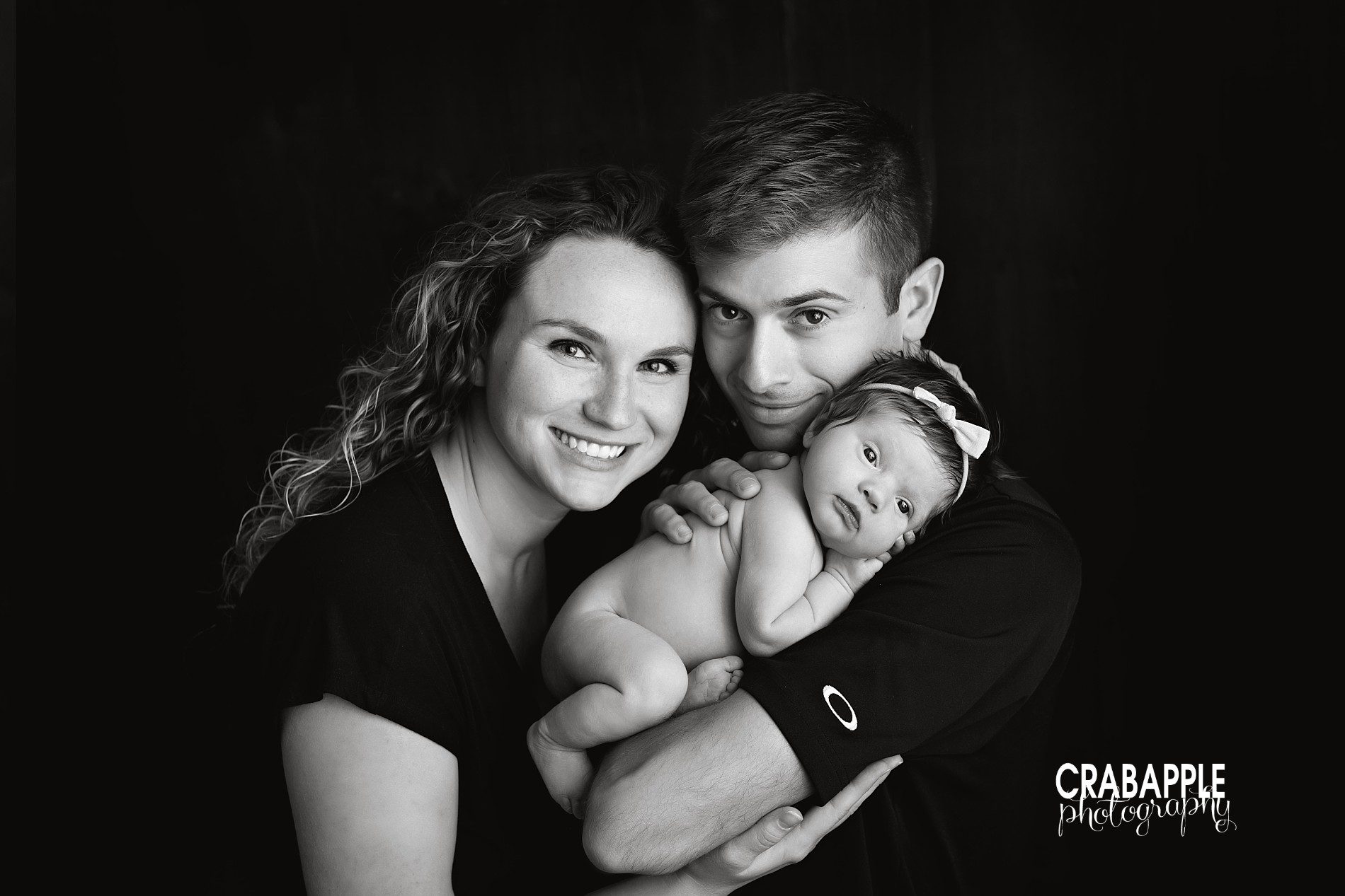 black and white newborn family portraits