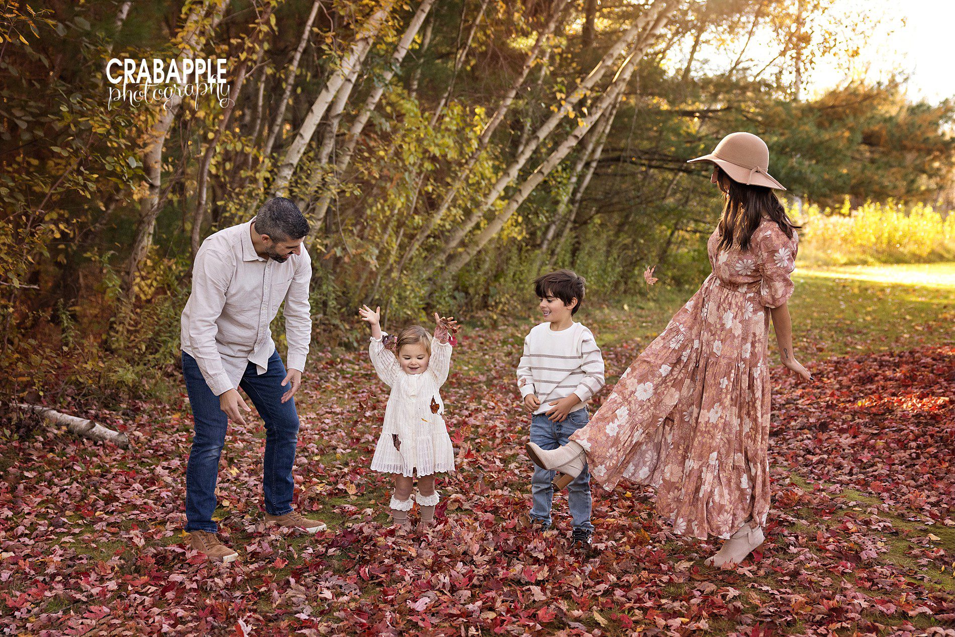 family photos playing in leaves