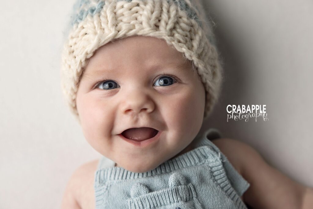 Amesbury Baby Boy Session Smiling 3 month old baby boy during milestone photography session in Amesbury MA