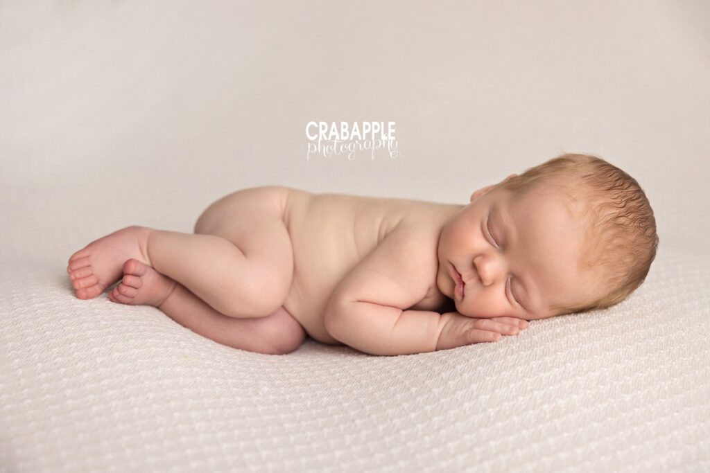 Professional Newborn Photography Pose Professional newborn photography pose featuring a peacefully sleeping baby