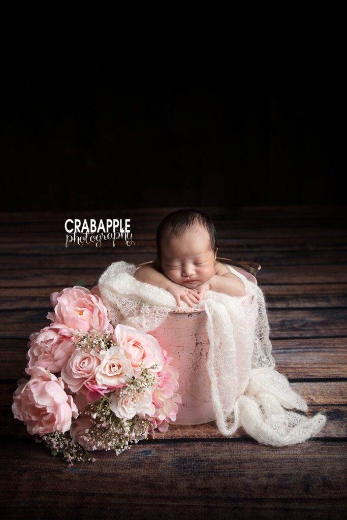 Baby girl with pink roses and lace wrap 