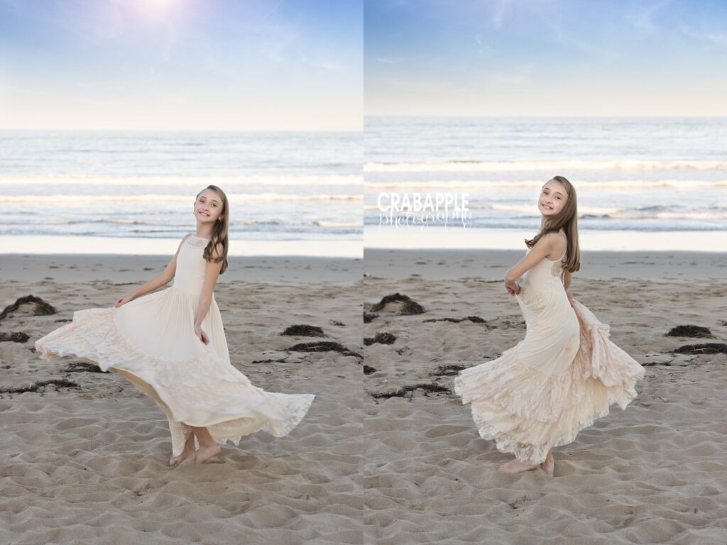 Young girl twirling in dress during beach photoshoot