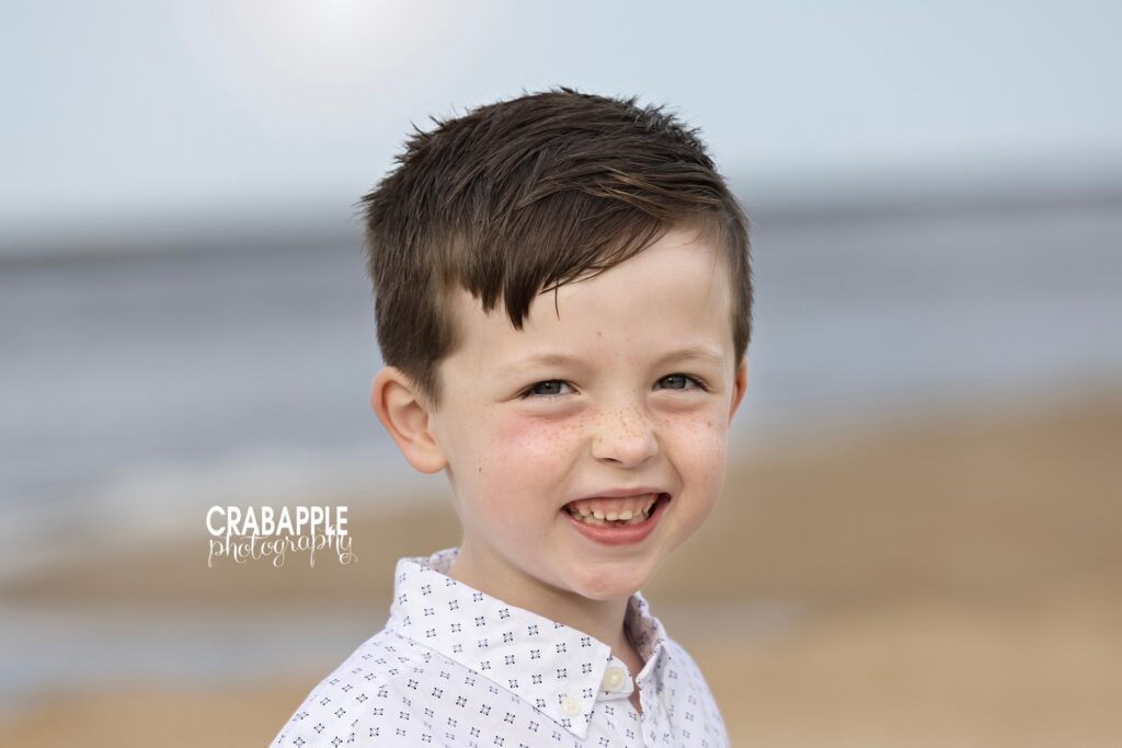 Close up of a smiling young boy during North Shore MA family photography session