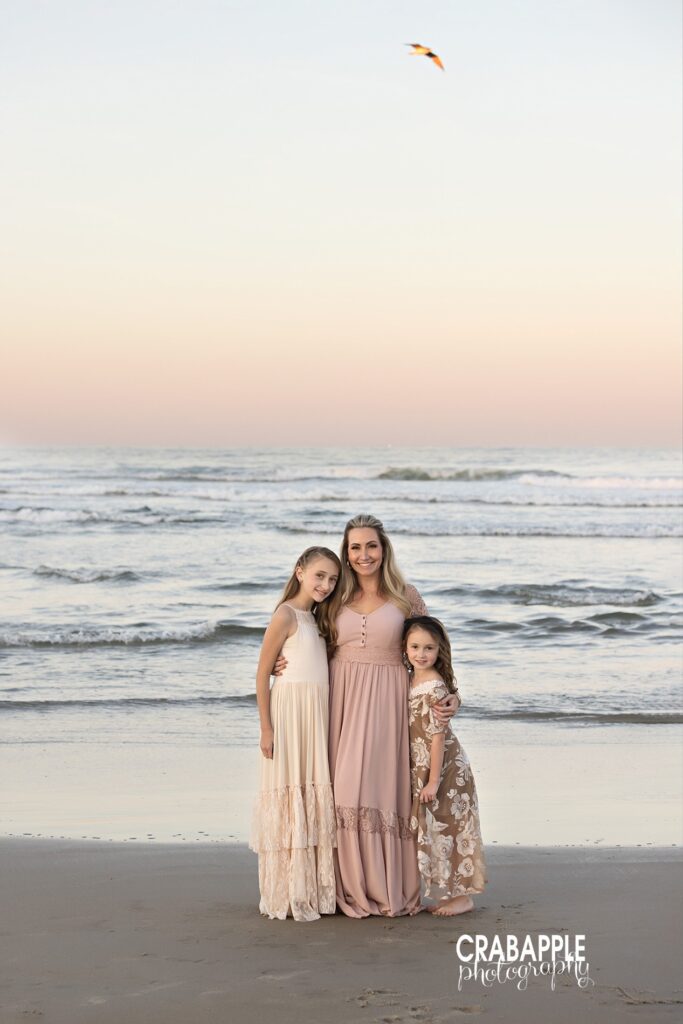 Sunset family photos on the Boston shoreline Family walking along shoreline during sunset family photos near Boston