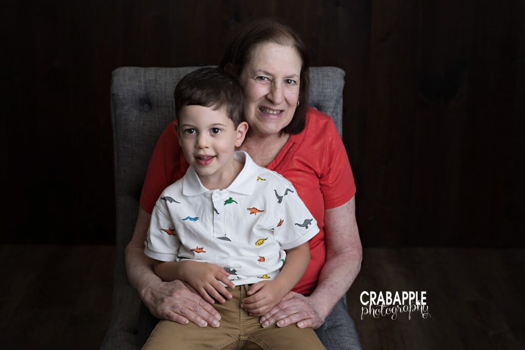 Sweet generational moment from a Lexington MA family session Multi-generational photo with smiling grandma and toddler grandson