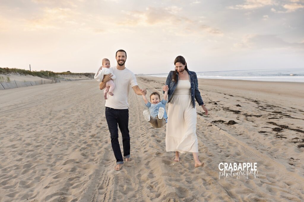 Fun and playful family portraits during a beautiful sunset beach session near Boston MA