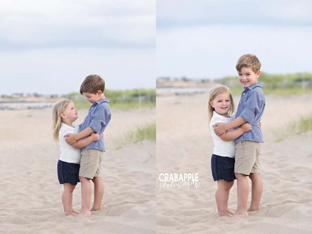 Brother and sister share a hug during a family beach photo session near Boston