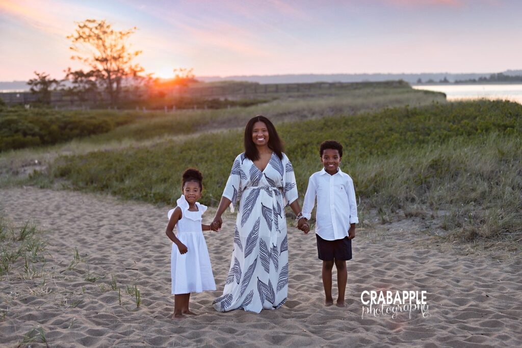Neutral color palette with visually interesting prints for family photos on the beach
