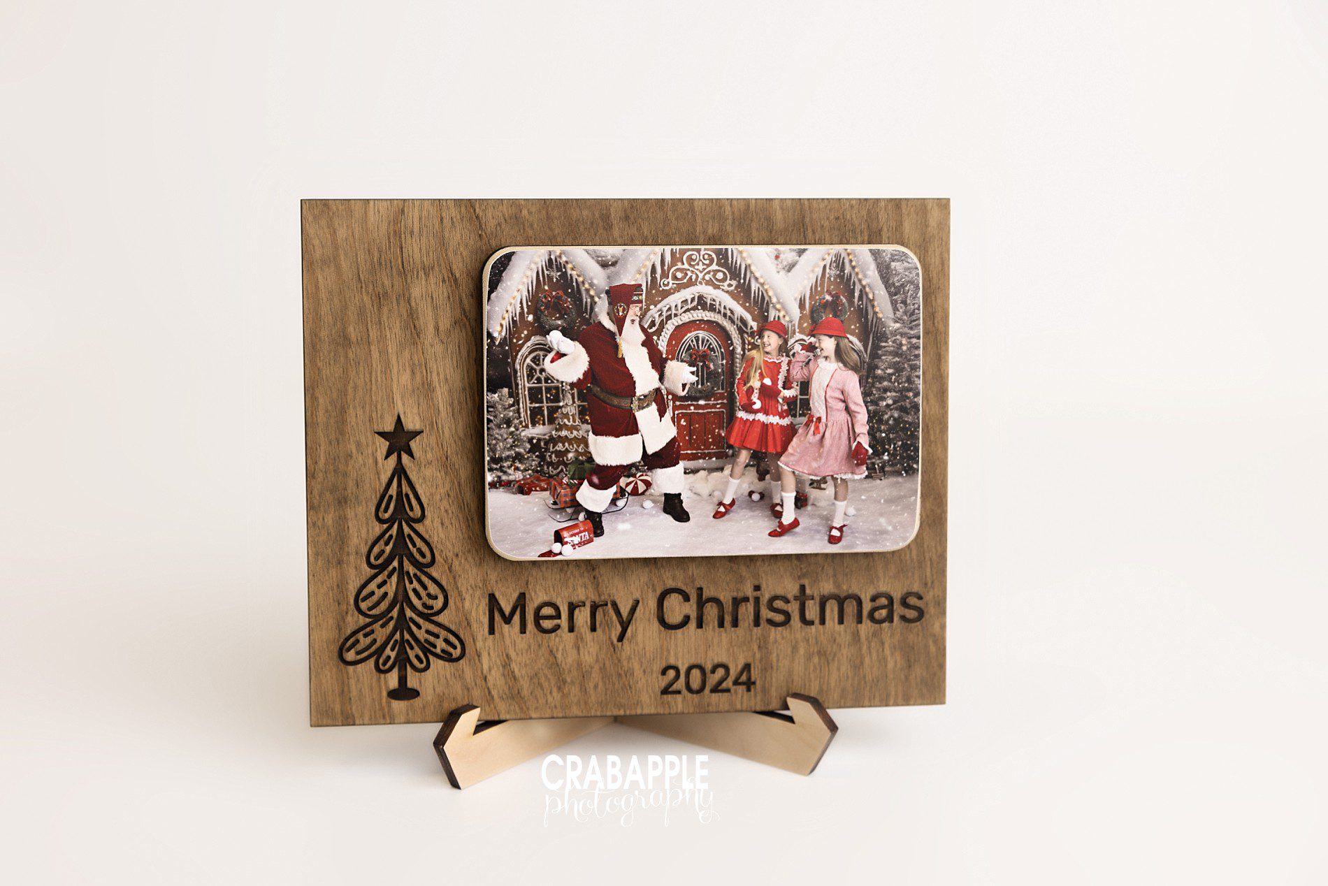 A landscape layout design for Christmas keepsake using your portrait and customized with a message and the year