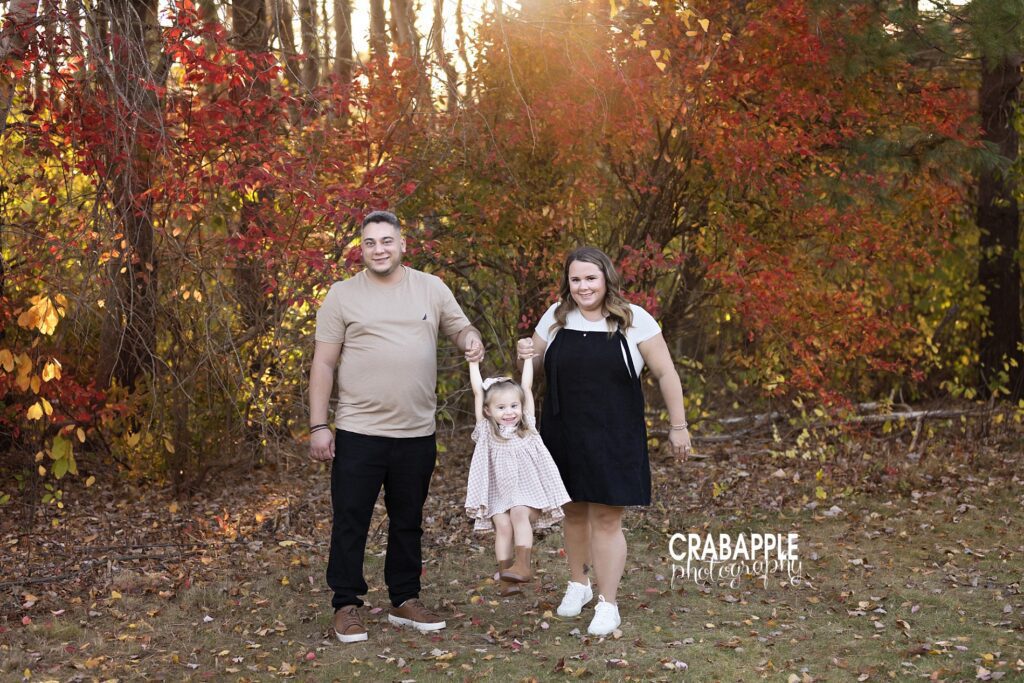 Cozy neutral family photo outfits in soft beige, cream, and black for fall portraits