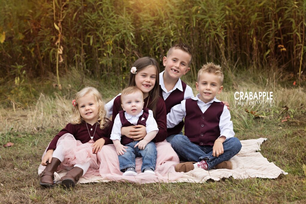 Styling ideas for sibling portraits outside during the fall