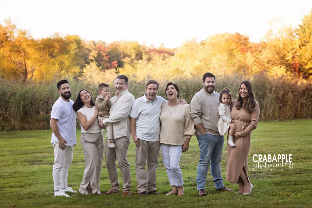 Outdoor fall family portraits in Andover Massachusetts with multiple generations.