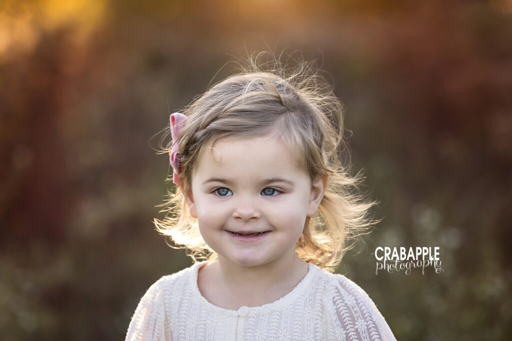 Wakefield toddler photographer Close up portrait of a toddler girl during her family photo session and fall children portraits