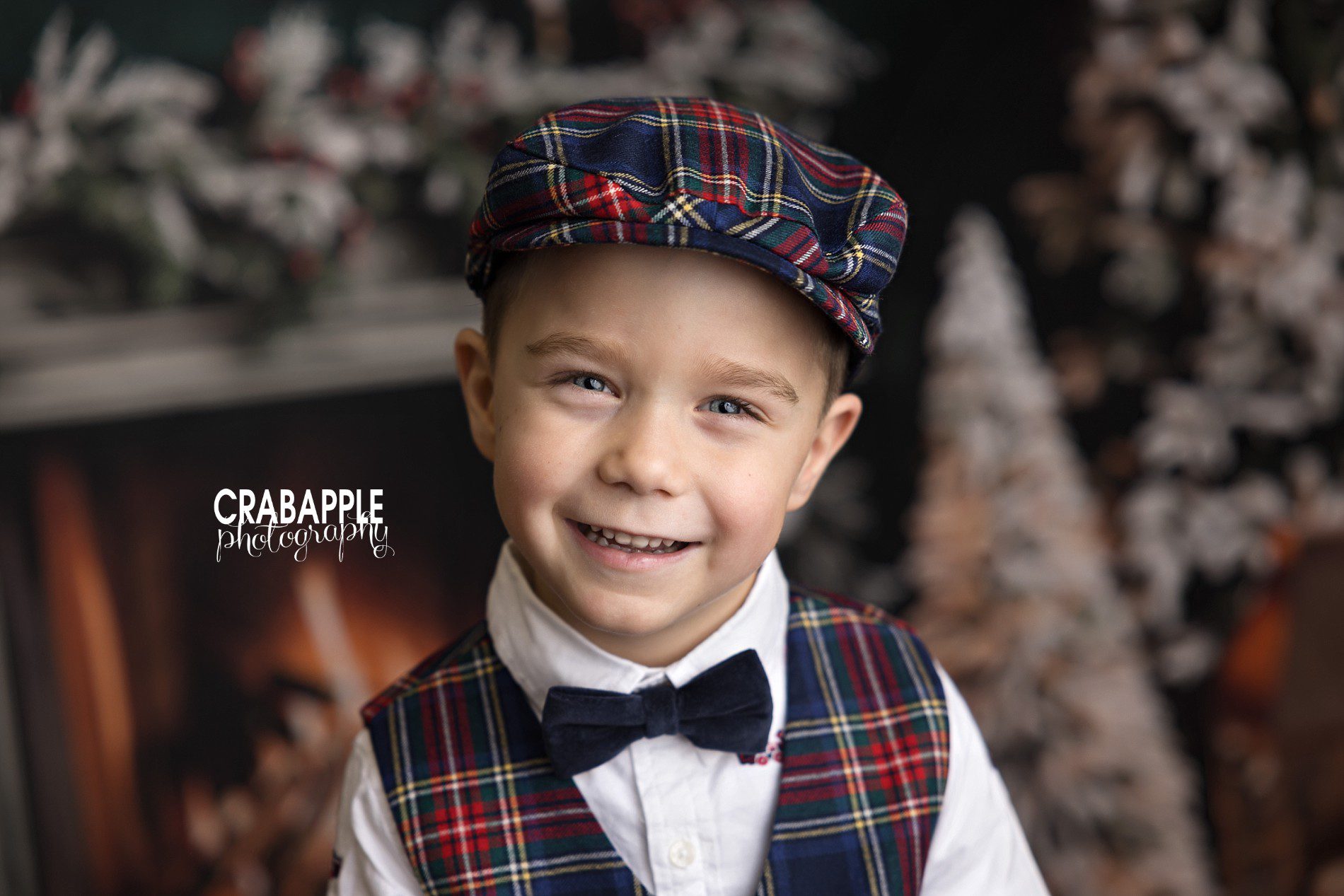 Close up solo portrait of a young boy during holiday portraits near Boston MA