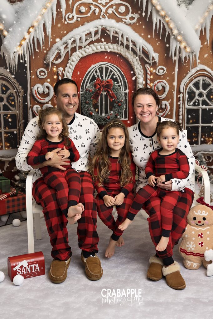 Fun and festive Christmas family photos in coordinating pajamas