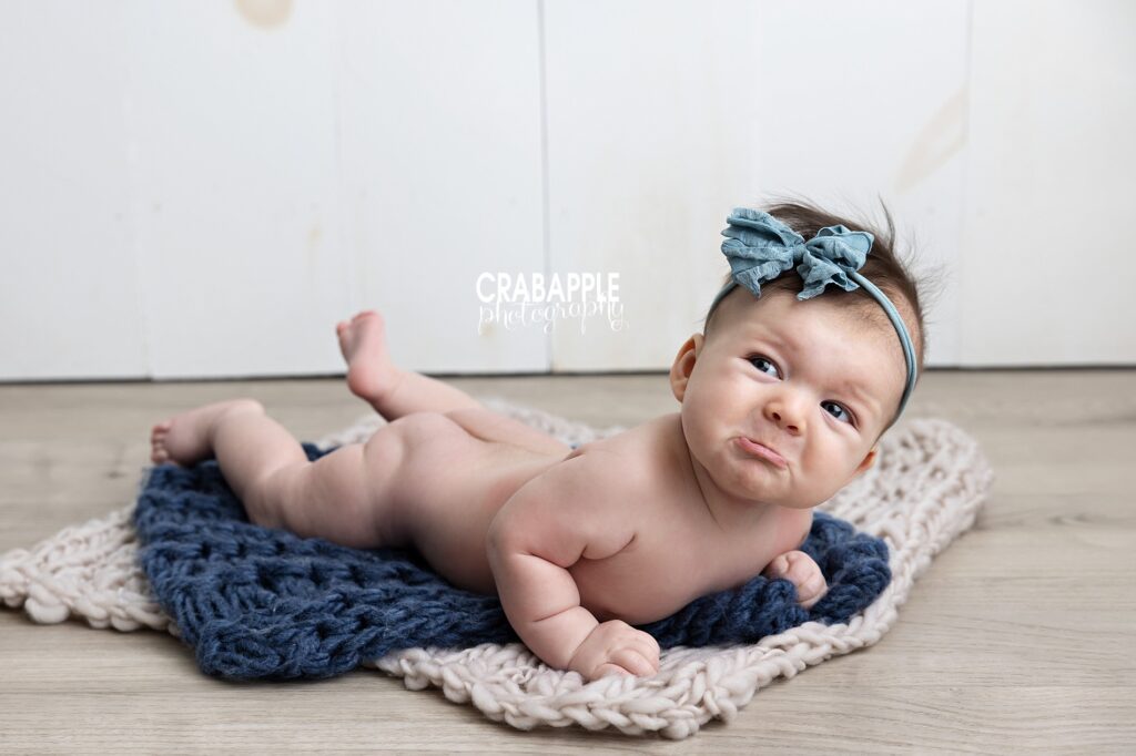Andover MA baby photographer capturing baby girl tummy time milestone portraits
