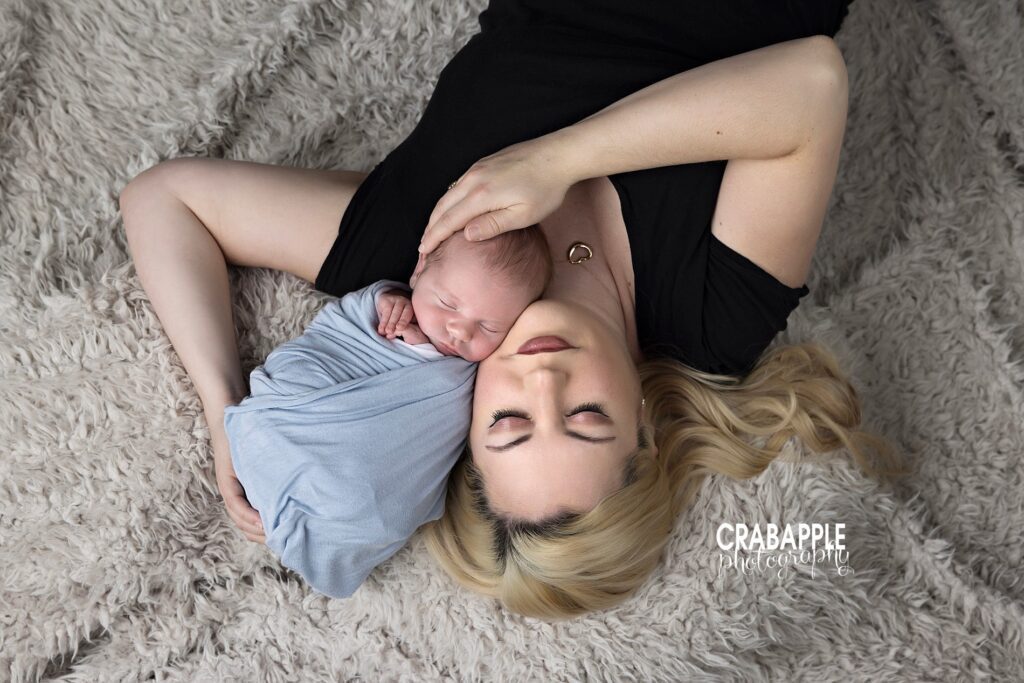 Tender moment between mom and baby during Andover newborn photo session
