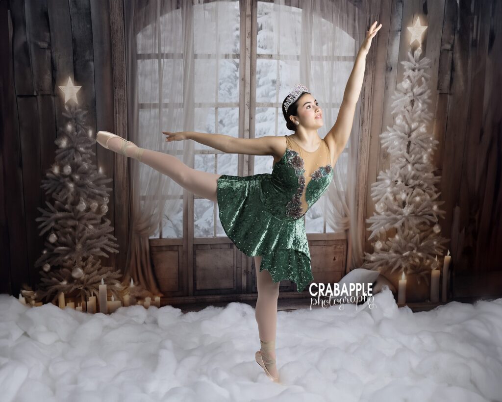 Teen dancer posing in ballet costume by winter window set
