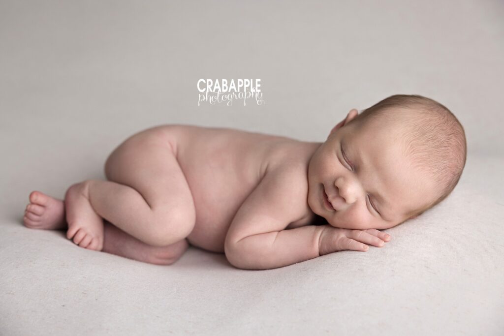 Minimalist newborn photoshoot ideas Minimalist newborn portrait with white backdrop during north of Boston area photography session