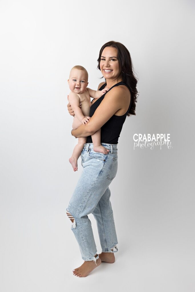 Mom and baby studio photos during a 9 month baby photoshoot

