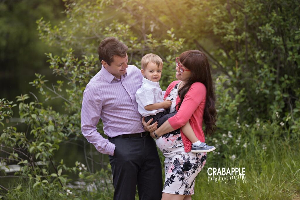 Outdoor maternity family portrait with expecting parents and toddler son for wood mounted family wall art

