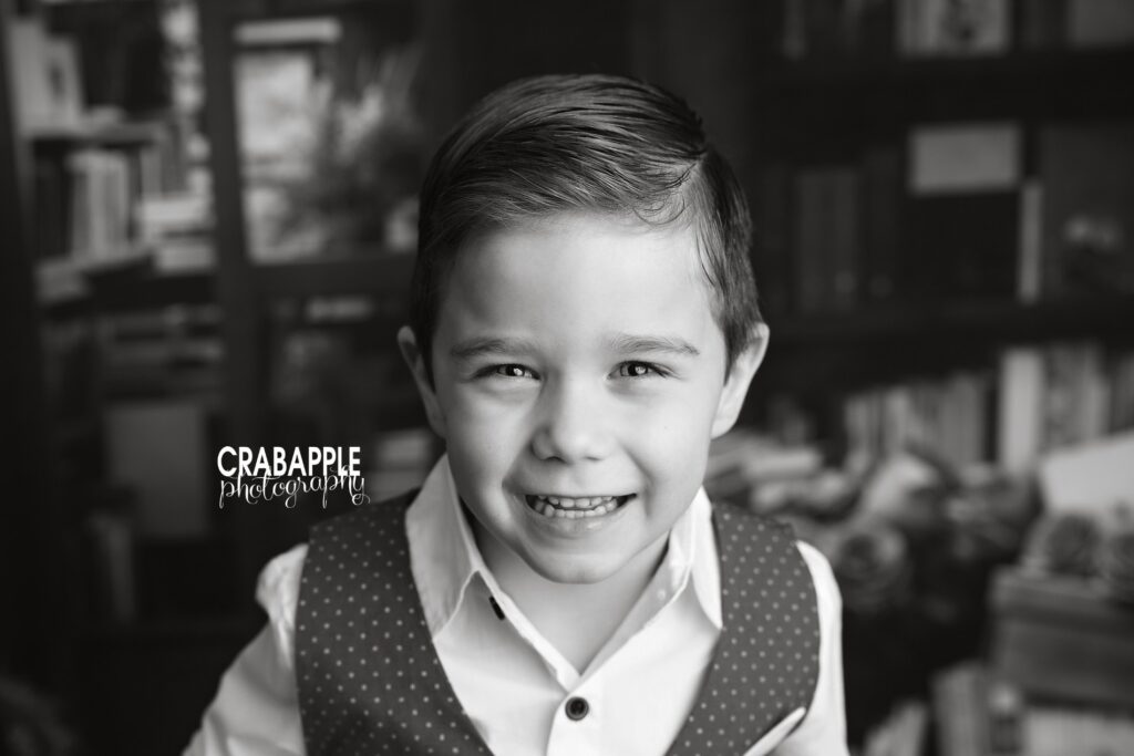 Valentine’s Day photos for boys in Andover MA studio Valentine’s Day photos for boys featuring a smiling 5 year old in a styled studio session in Andover MA