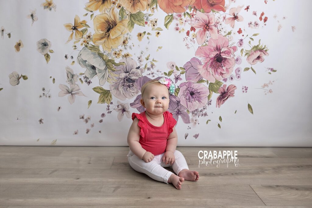 classic baby portrait photography Bedford MA studio studio baby portrait of smiling baby girl sitter session Bedford MA